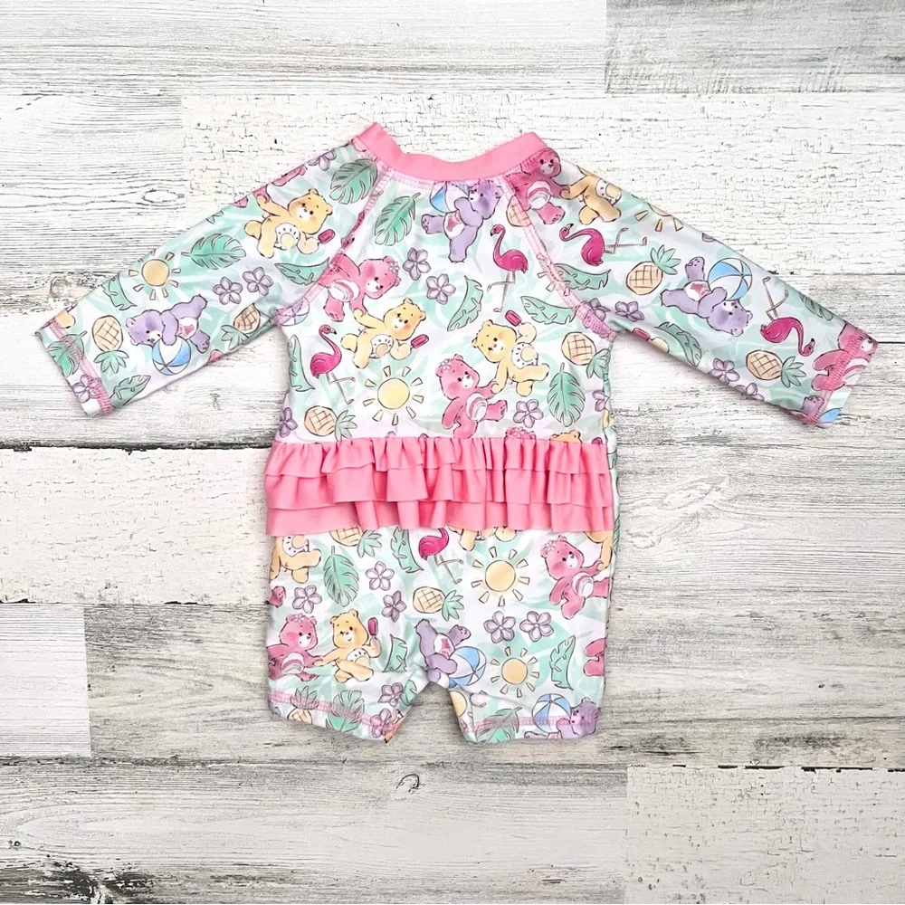 🍄 3/$15 Care Bears Baby Rashguard One Piece 0-3M Long Sleeve Ruffle Butt Swim